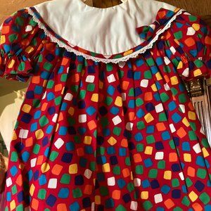 MARTHA'S TOO DRESS PRETTY IN THIS COLORFUL DRESS